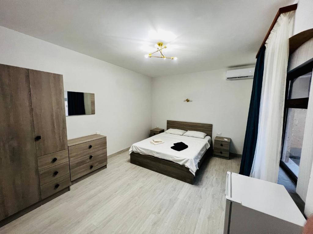 Postel nebo postele na pokoji v ubytování General guesthouse