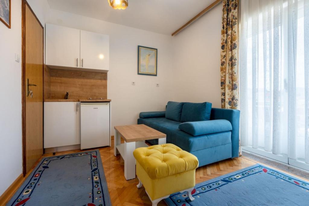 Posezení v ubytování Apartments and rooms Lotus