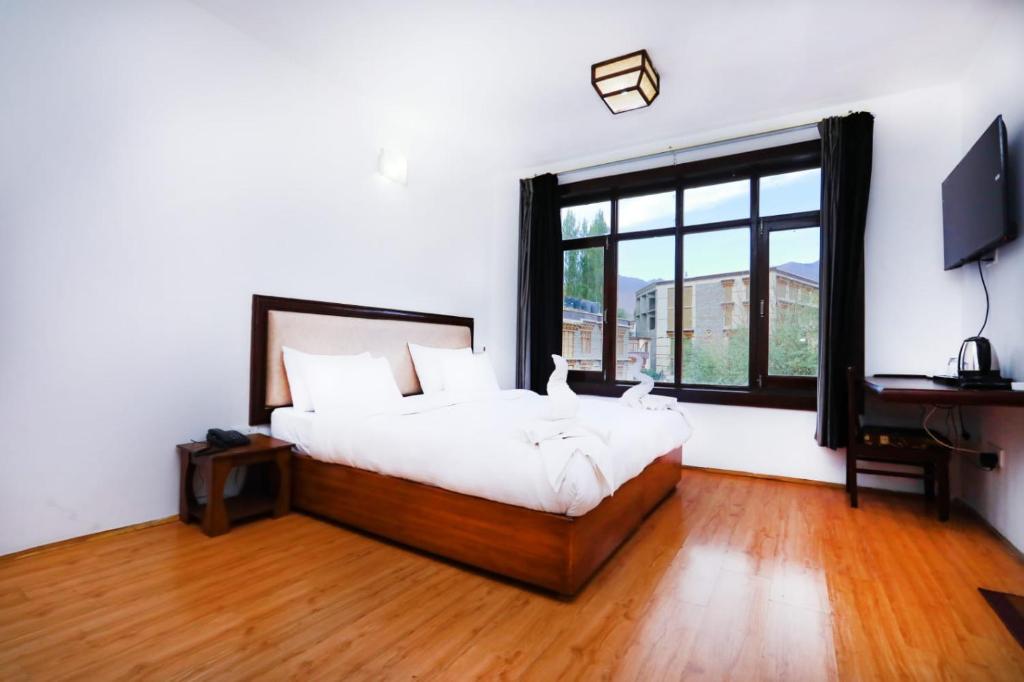 En eller flere senge i et værelse på Hotel Sky Desert - Leh Ladakh UT