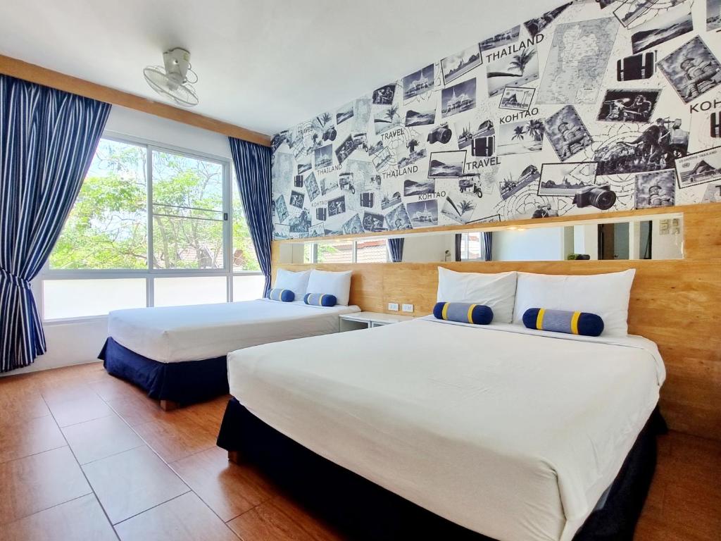 Postel nebo postele na pokoji v ubytování MAR24 Koh Tao Hotel