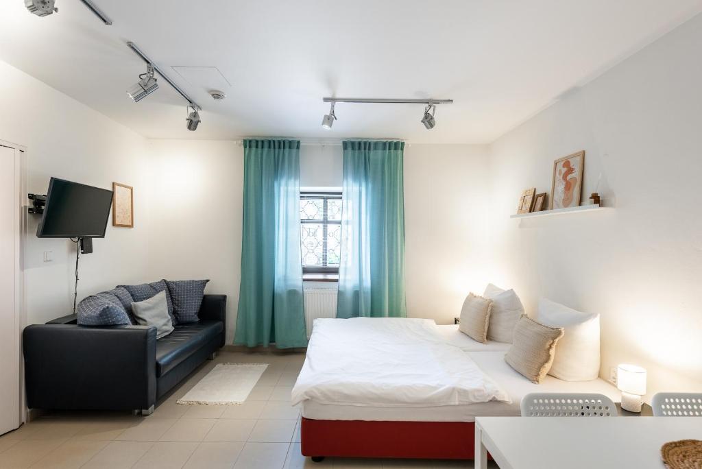 Postel nebo postele na pokoji v ubytování Apartmán Muzeum obchodu