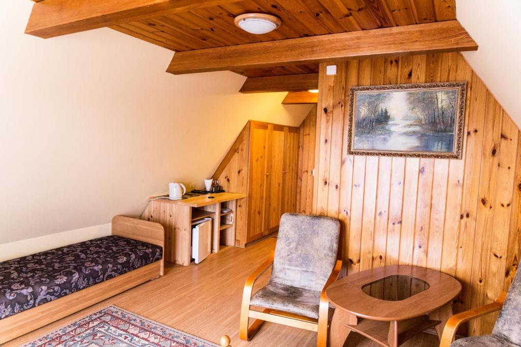 Posedenie v ubytovaní Domek Pod Klonem Agroturystyka