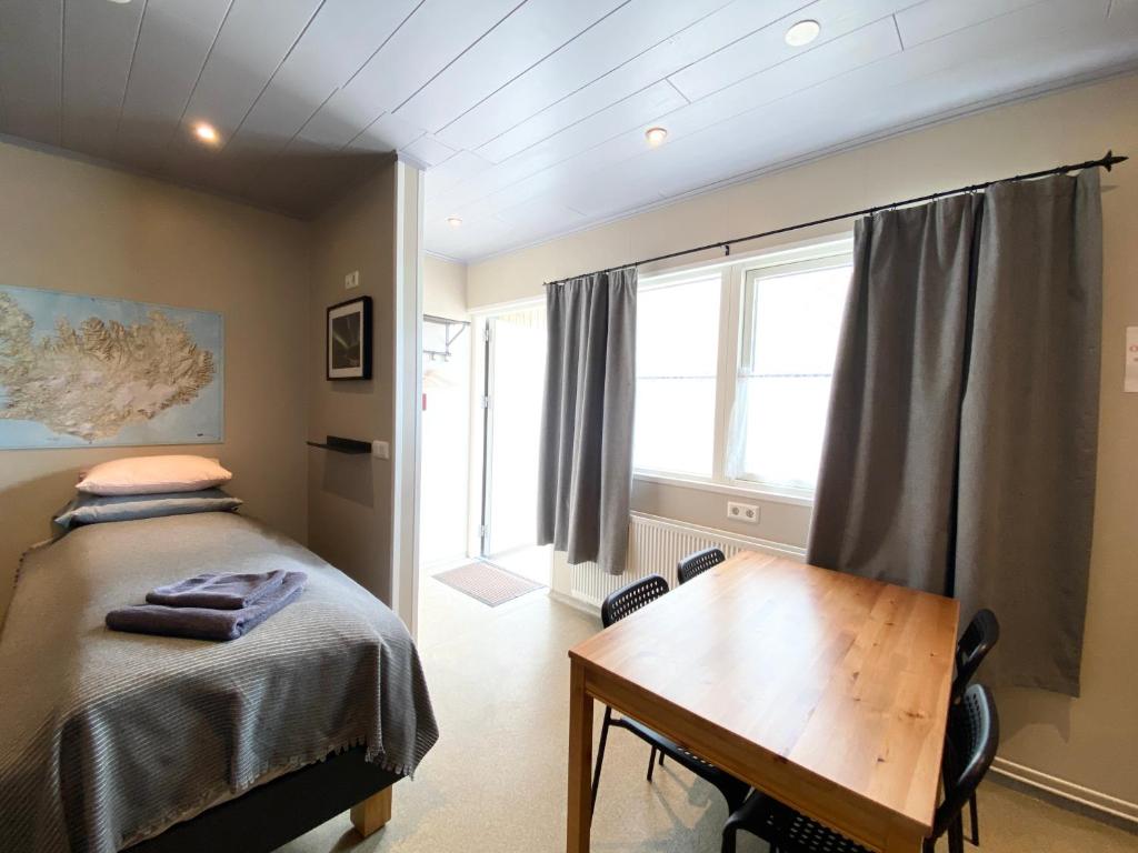 Ένα ή περισσότερα κρεβάτια σε δωμάτιο στο Studio Apartments