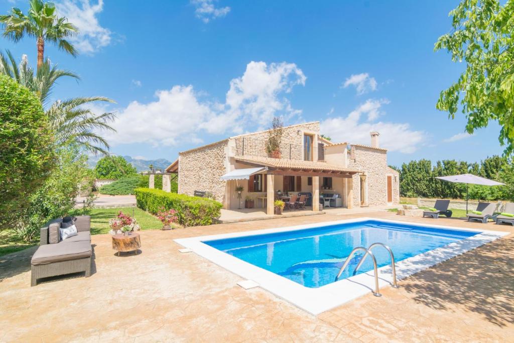 an image of a villa with a swimming pool at Finca Miralles in Búger