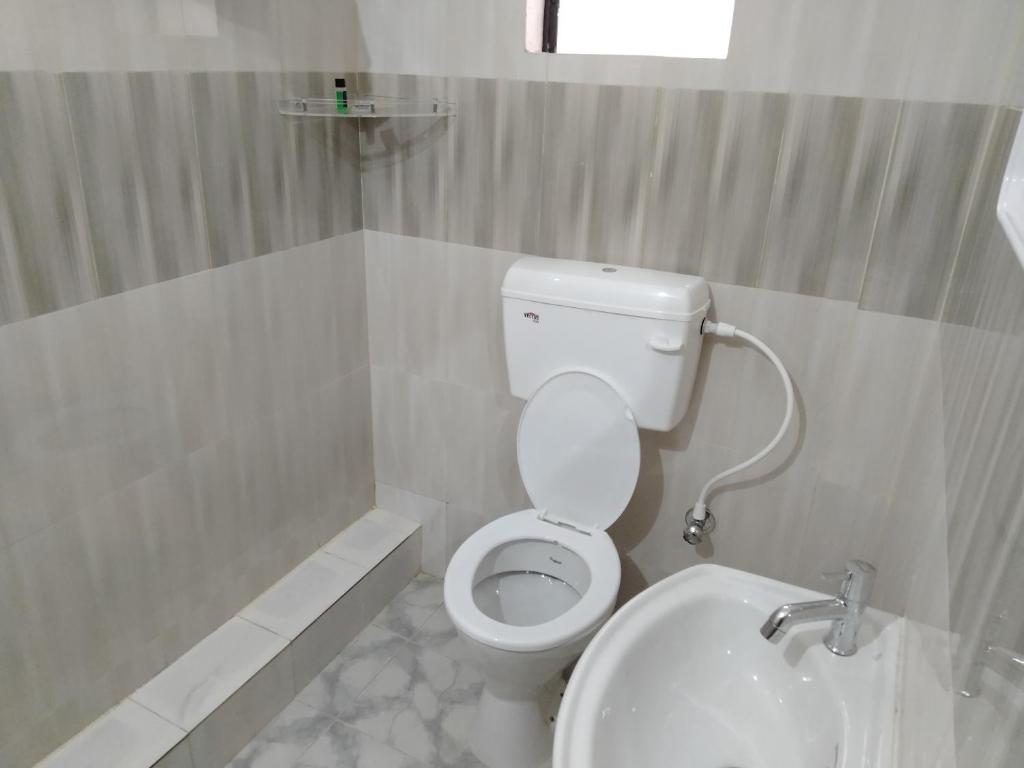 Koupelna v ubytování HOTEL SJ PREMIUM
