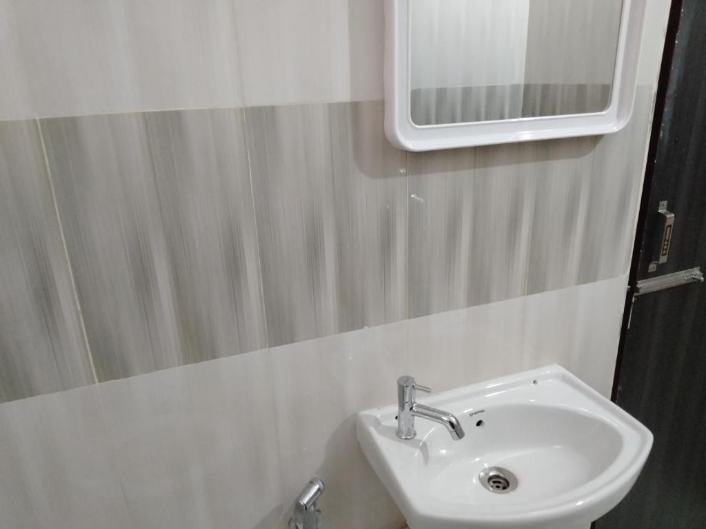 Koupelna v ubytování HOTEL SJ PREMIUM