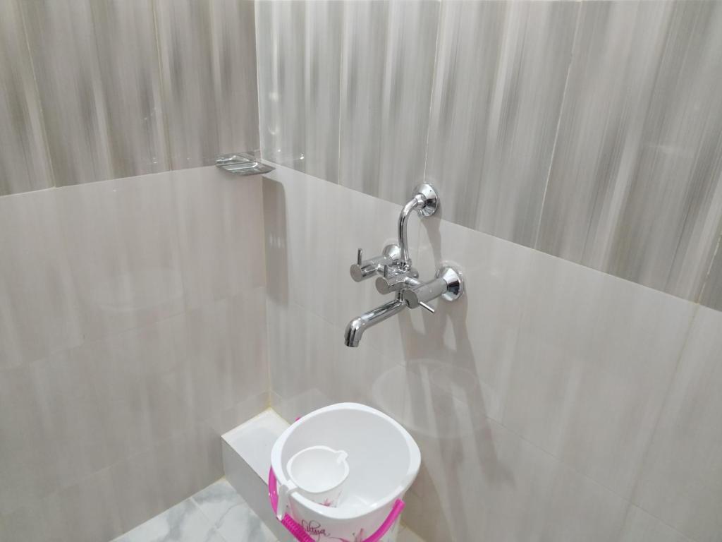 Koupelna v ubytování HOTEL SJ PREMIUM