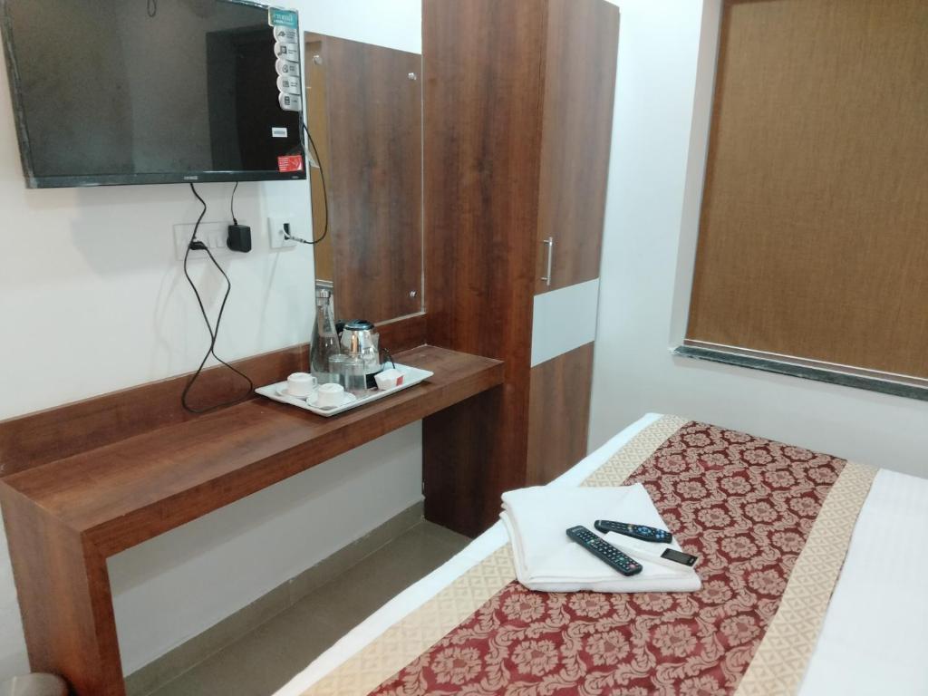 TV a/nebo společenská místnost v ubytování HOTEL SJ PREMIUM