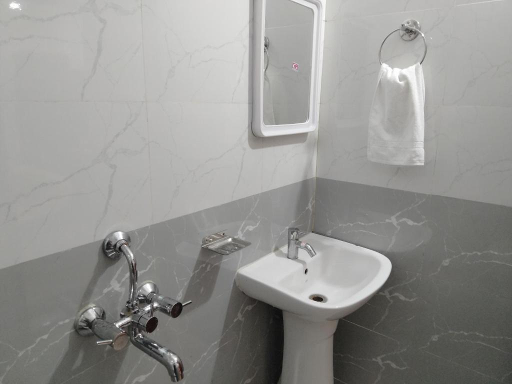 Koupelna v ubytování HOTEL SJ PREMIUM