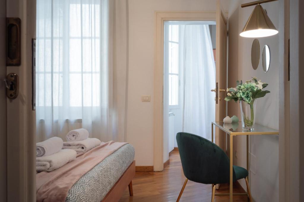 Posteľ alebo postele v izbe v ubytovaní Wine Apartments Florence Moscato