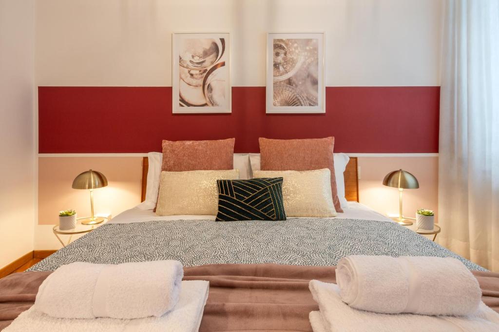 Posteľ alebo postele v izbe v ubytovaní Wine Apartments Florence Moscato