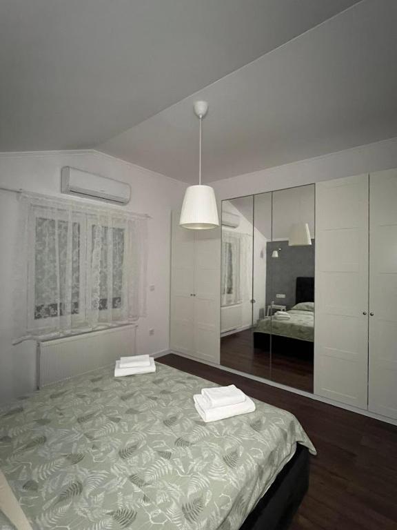 Postel nebo postele na pokoji v ubytování Exclusive apartment