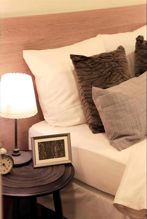 Postel nebo postele na pokoji v ubytování Sleephotels