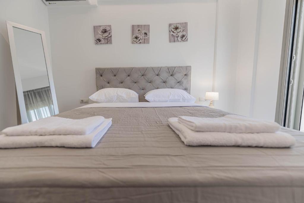 Postel nebo postele na pokoji v ubytování Diorisa House