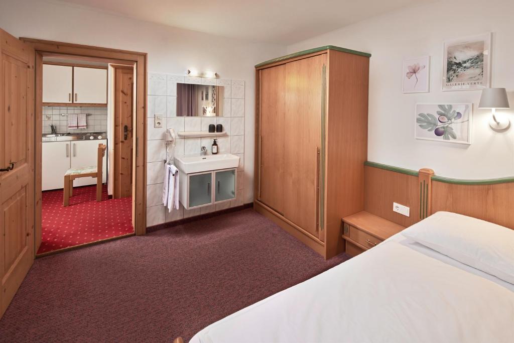Kuchyň nebo kuchyňský kout v ubytování Hotel Gasthof Siggen
