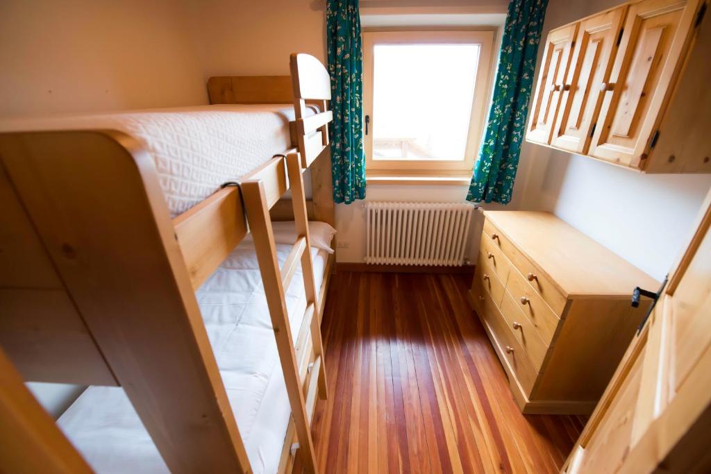 Posteľ alebo postele v izbe v ubytovaní Chalet Elena