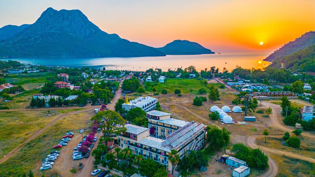 an aerial view of a building next to a lake at Adrasan Beach Club in Adrasan