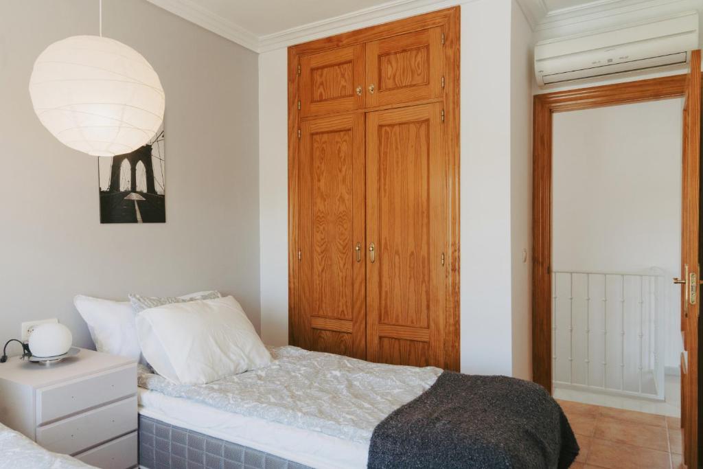 Łóżko lub łóżka w pokoju w obiekcie AP378 Casa Maria
