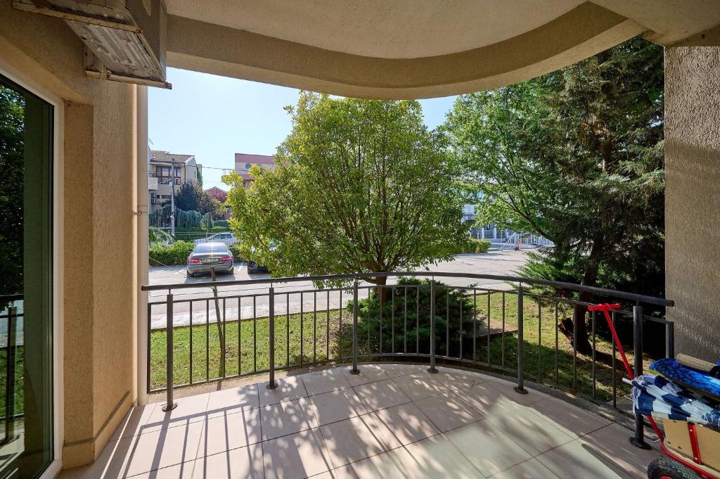 a balcony with a view of a street at SeaX Stay Apartment - free parking in Mamaia Sat/Năvodari
