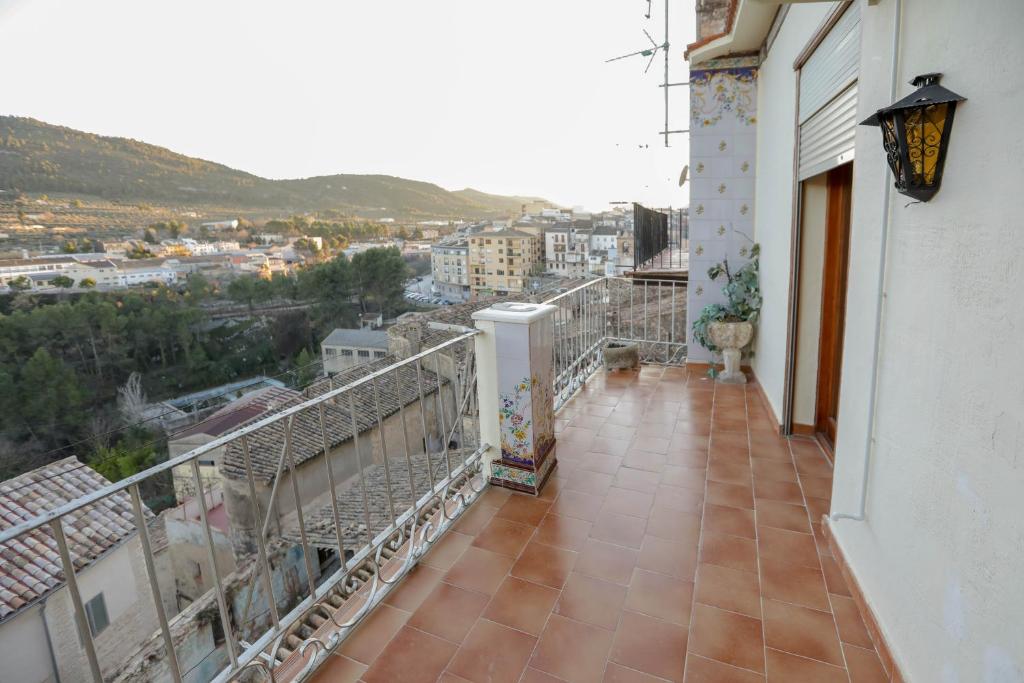 a balcony with a view of a city at Casa Auela Maria in Bocairent