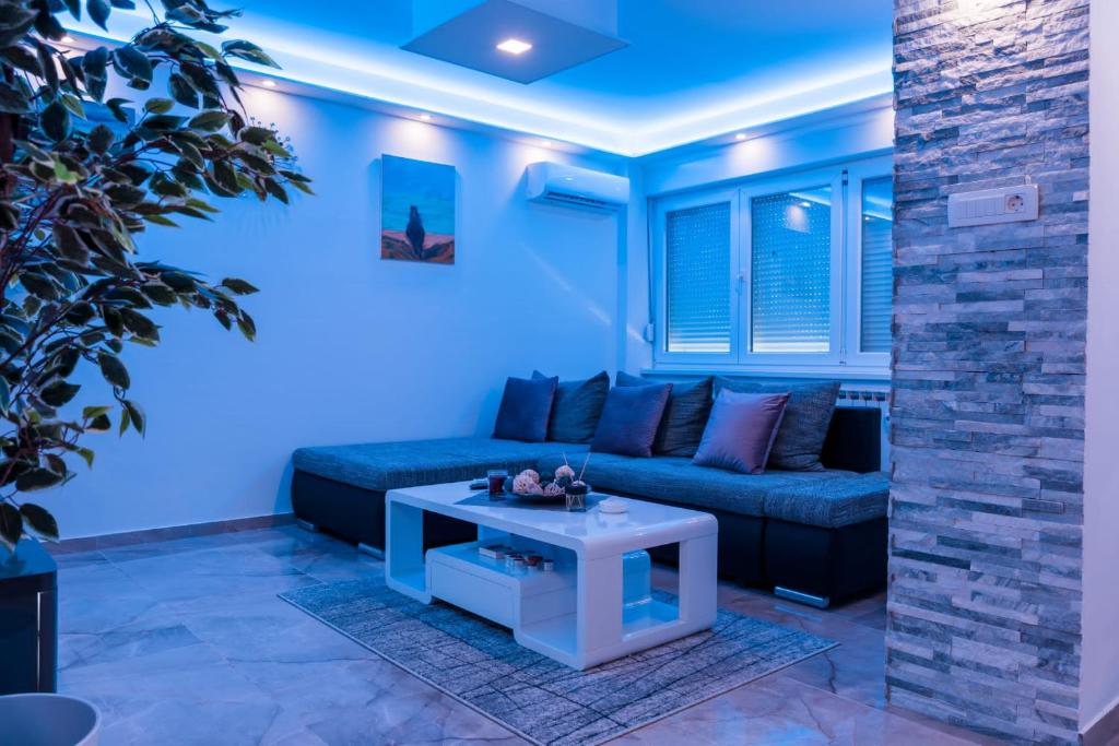 Posezení v ubytování Rayyan Apartment