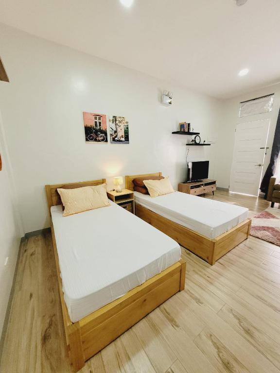 Postel nebo postele na pokoji v ubytování CAP Apartments