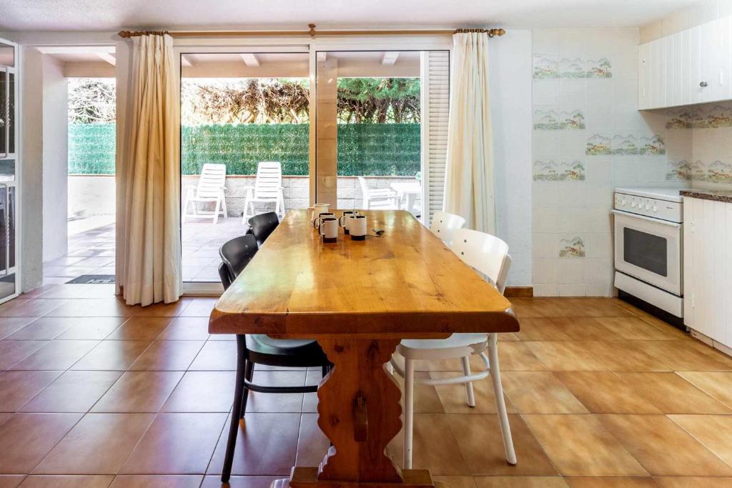 Kuchyňa alebo kuchynka v ubytovaní Carrilet 37 bxs Apartamento con terraza