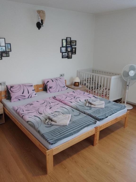Postel nebo postele na pokoji v ubytování apartman.lara