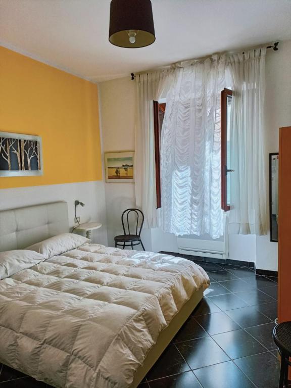 Postel nebo postele na pokoji v ubytování Affittacamere Sardegna Sole e Mare