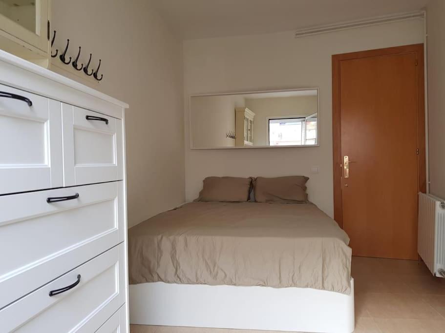 Postel nebo postele na pokoji v ubytování SITGES WELCOM HOME a summer flat in the heart of the village Sitges