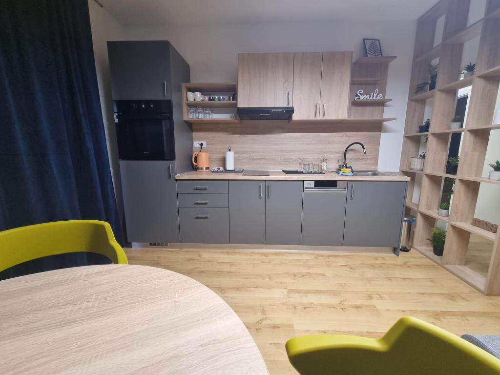 Kuchyň nebo kuchyňský kout v ubytování KFN Concept One
