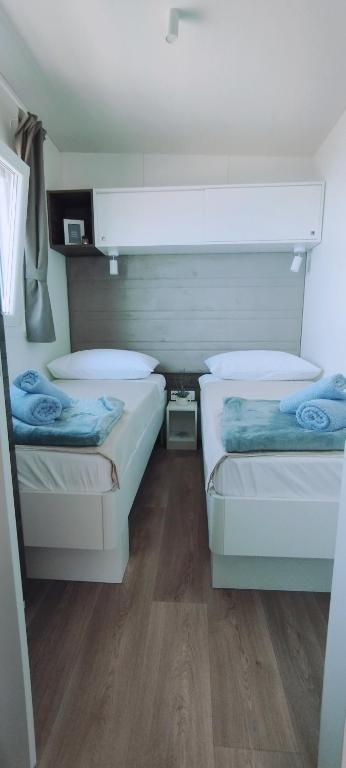 Postel nebo postele na pokoji v ubytování Mobile home Greta