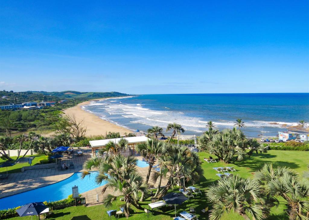 an aerial view of a resort and the beach at Blue Marlin Hotel by Dream Resorts in Scottburgh