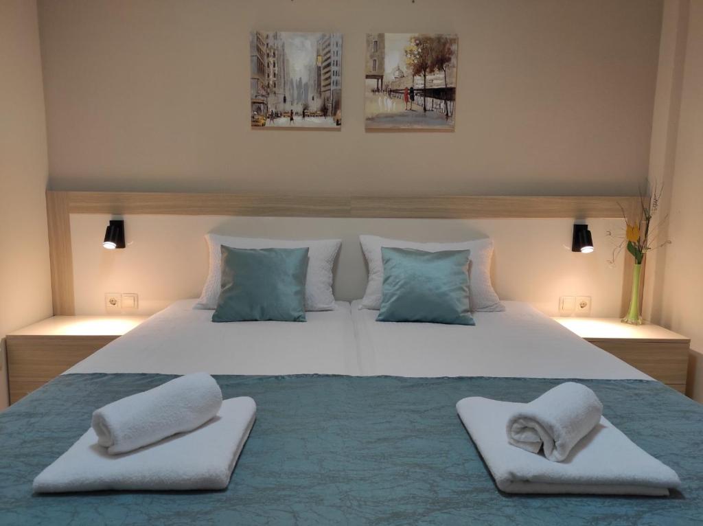 Postel nebo postele na pokoji v ubytování Guest House Nova