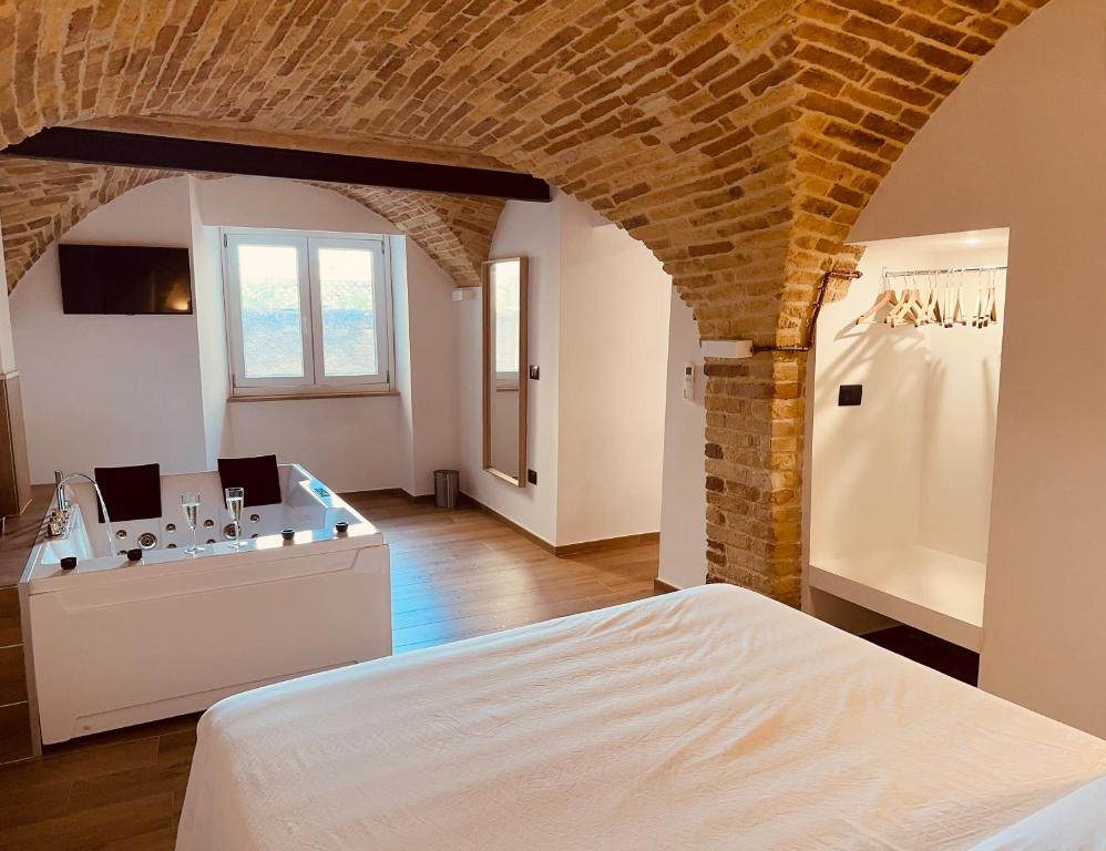 Posteľ alebo postele v izbe v ubytovaní B&B Civico 35