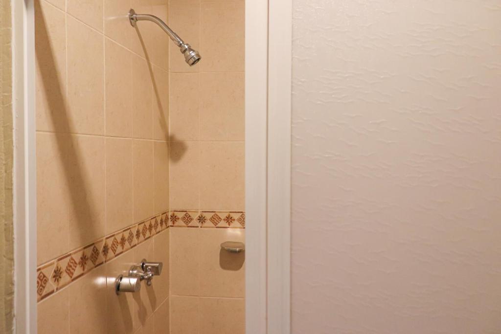 Vannituba majutusasutuses Hotel Coroneo