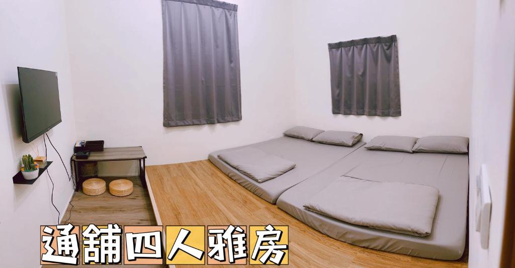 Postel nebo postele na pokoji v ubytování 東澳海安獨木舟背包客棧Hai An 2 Hostel