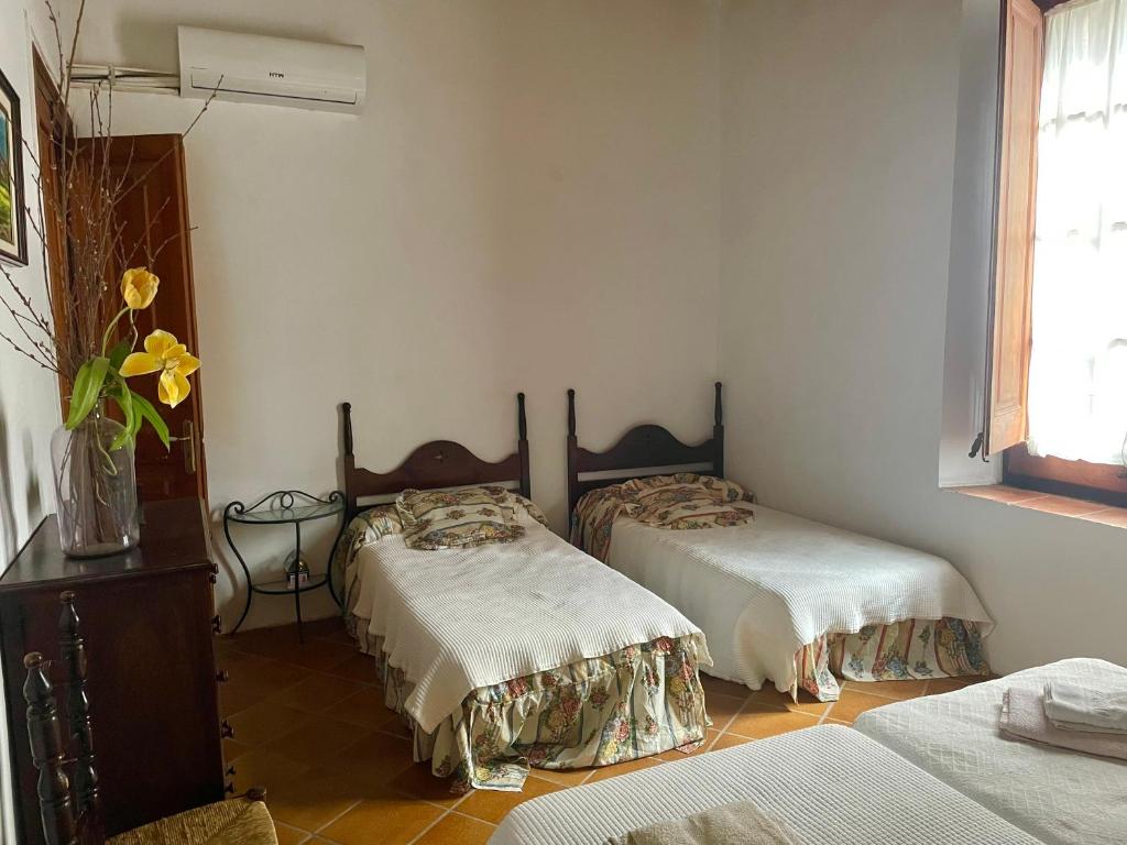 Postel nebo postele na pokoji v ubytování Casa Rural para descansar piscina cerca