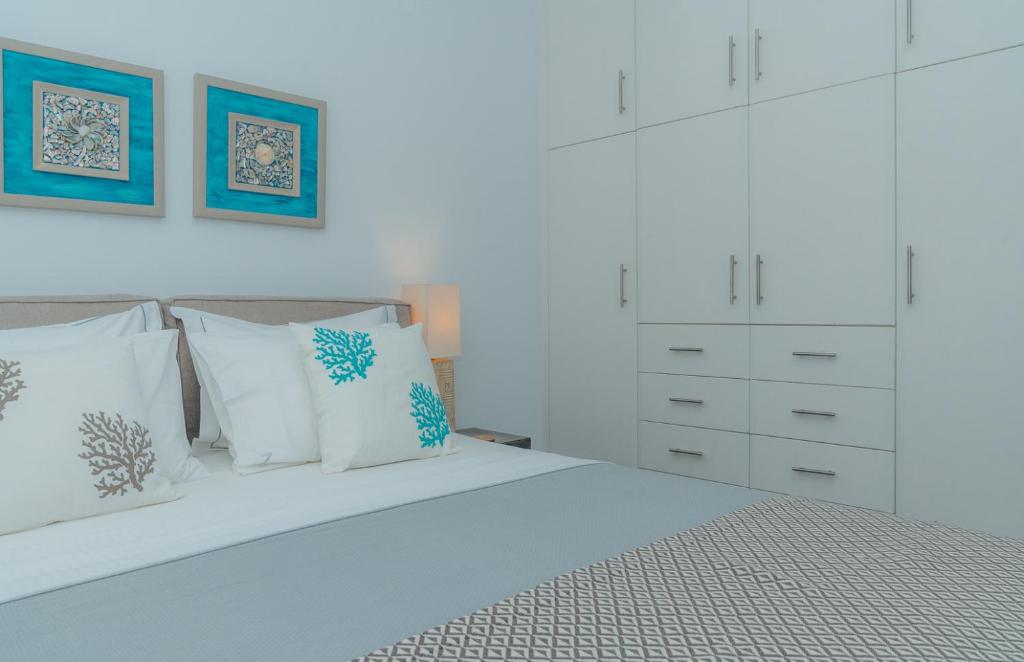 A bed or beds in a room at Erifili Houses