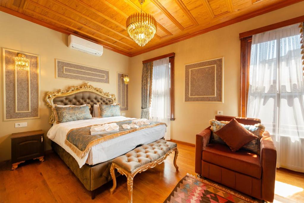 Postel nebo postele na pokoji v ubytování Brown Mansion Oldcity