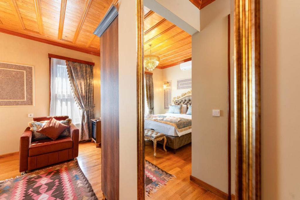 Postel nebo postele na pokoji v ubytování Brown Mansion Oldcity