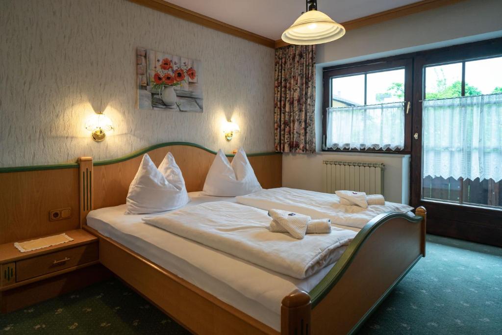 Postel nebo postele na pokoji v ubytování Der Bräuschmied