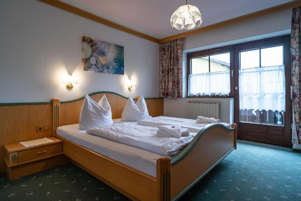 Postel nebo postele na pokoji v ubytování Der Bräuschmied