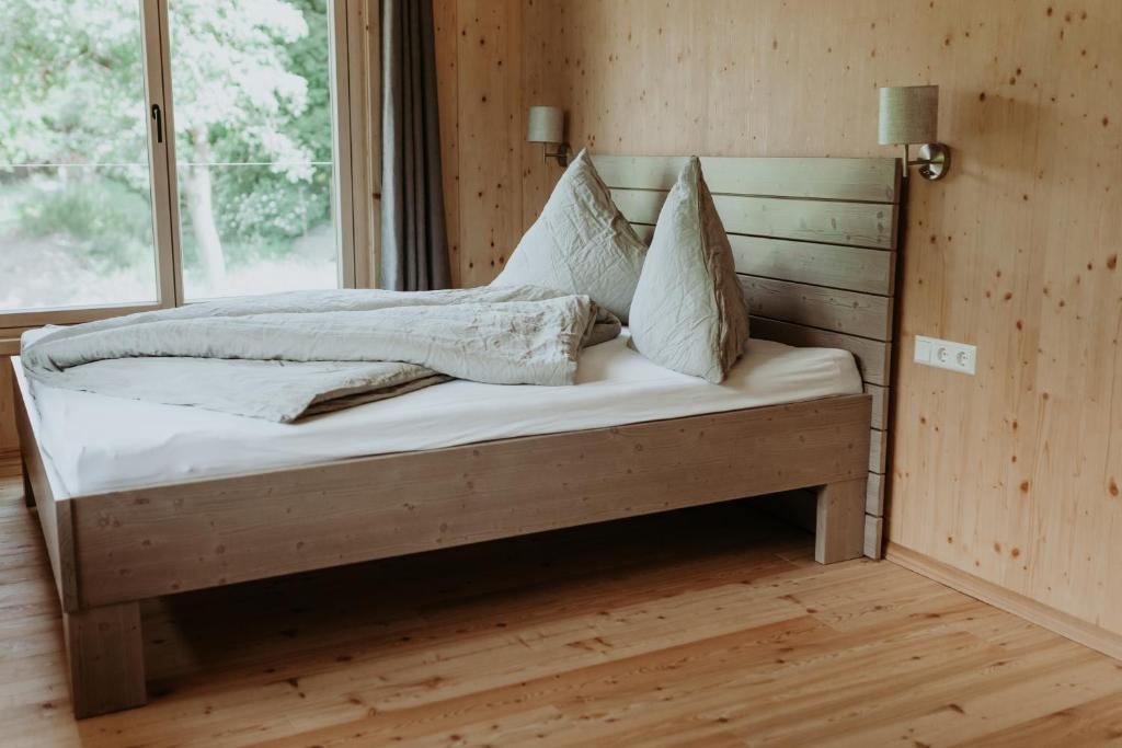 מיטה או מיטות בחדר ב-das Oberörtl - Kötschach-Mauthen