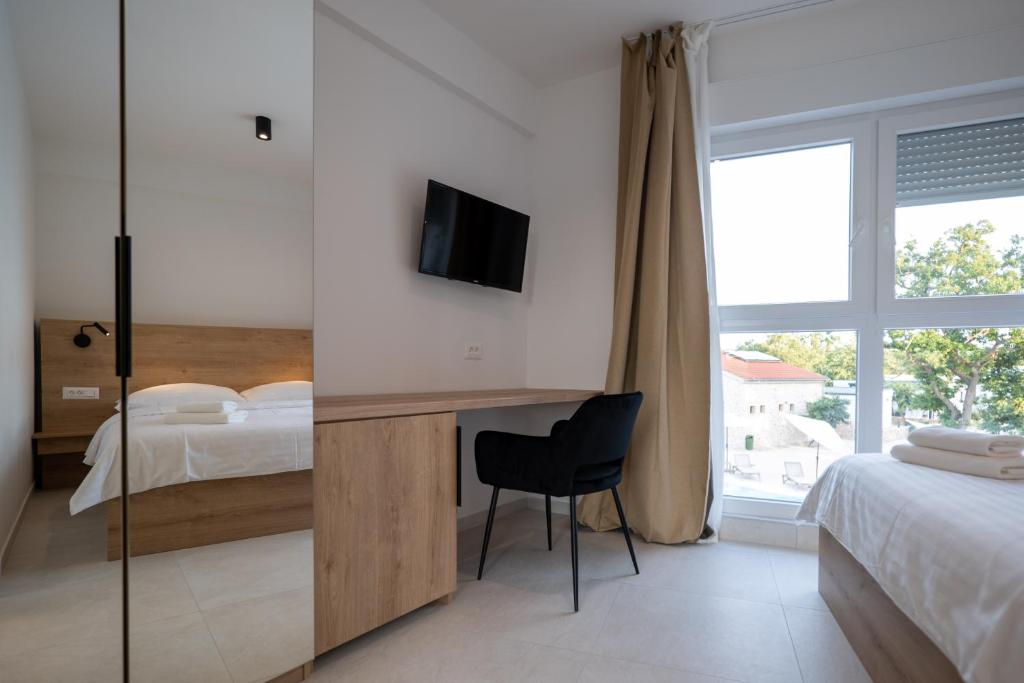 Dionis Camping Zaton客房内的一张或多张床位