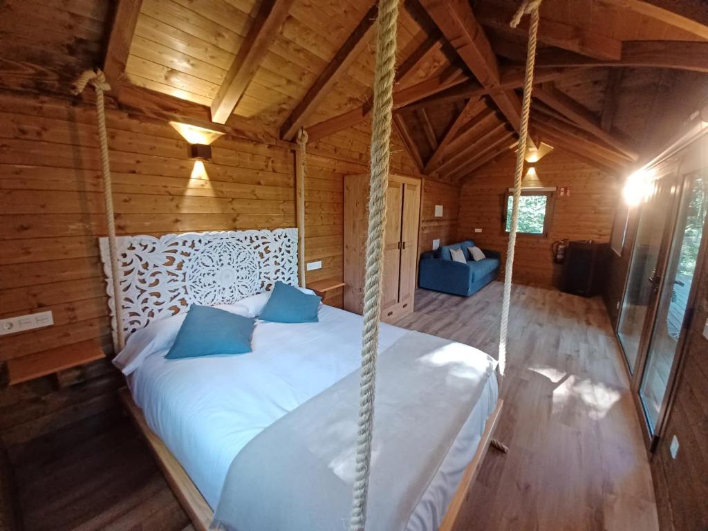 Postel nebo postele na pokoji v ubytování IRATIKO KABIAK