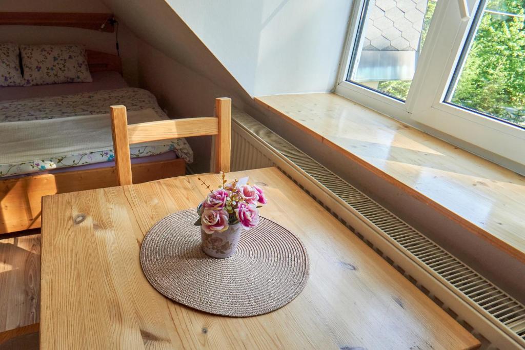 Una cama o camas en una habitación de Chata Harmonie