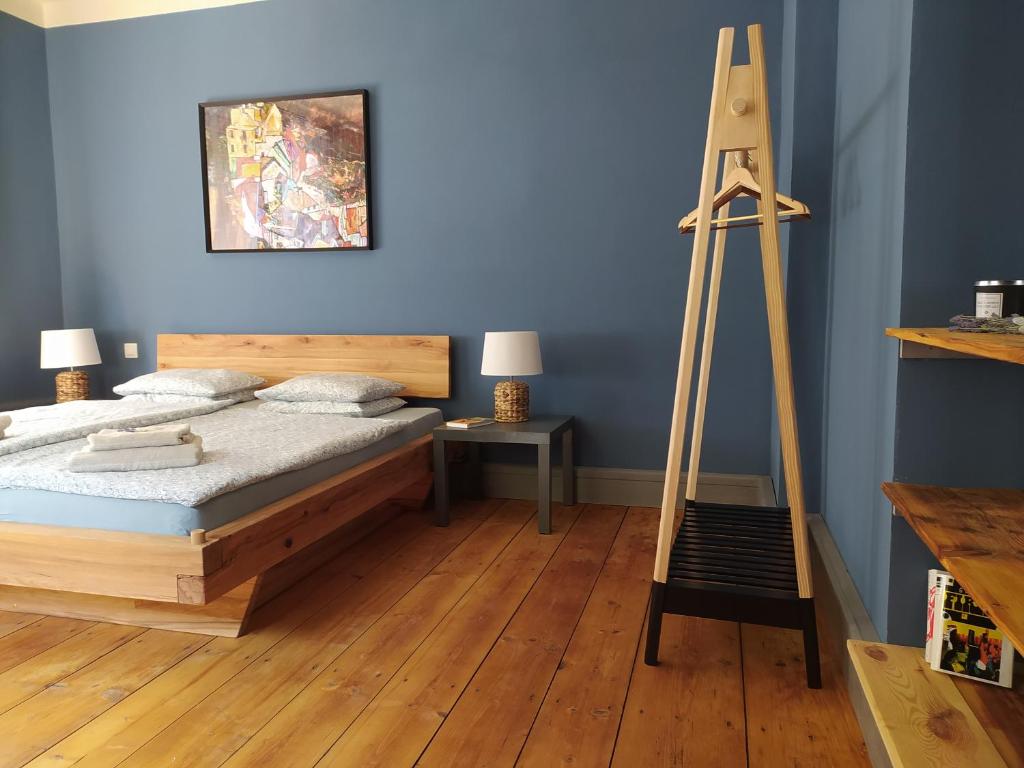 Postel nebo postele na pokoji v ubytování Pod hradbami Křivoklát