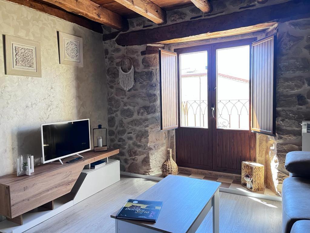 TV a/nebo společenská místnost v ubytování Apartamentos Numancia