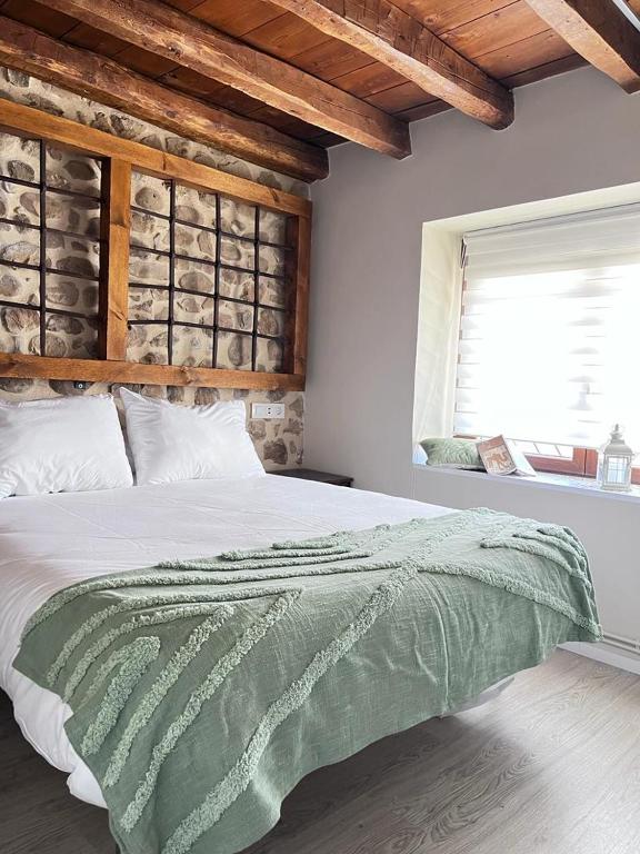 Postel nebo postele na pokoji v ubytování Apartamentos Numancia